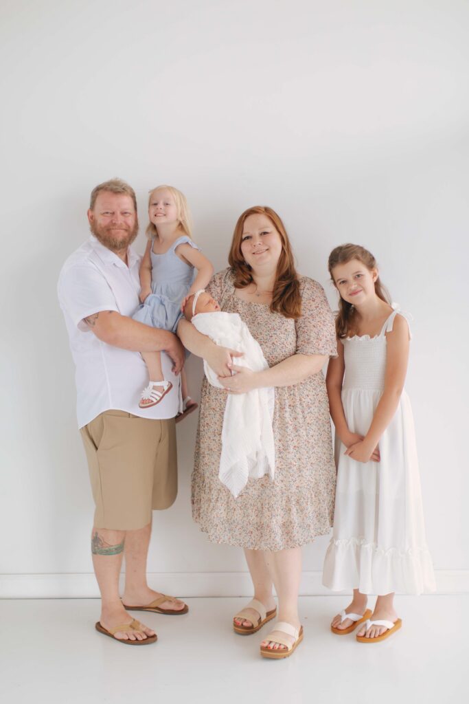 family photo newborn session taken in studio